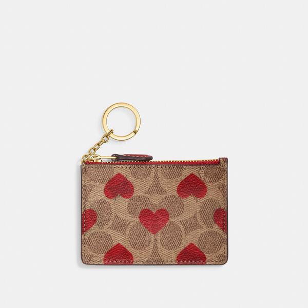 Mini Skinny Id Case In Signature Canvas With Heart Print